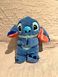 https://cdn.shopify.com/s/files/1/0593/4487/9685/files/stich_azul_normal.jpg?v=1730738233